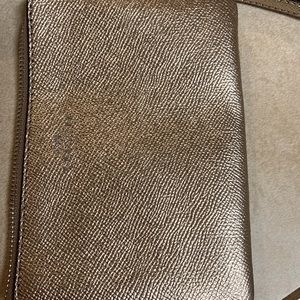 Brand new Gold Coach Wristlet